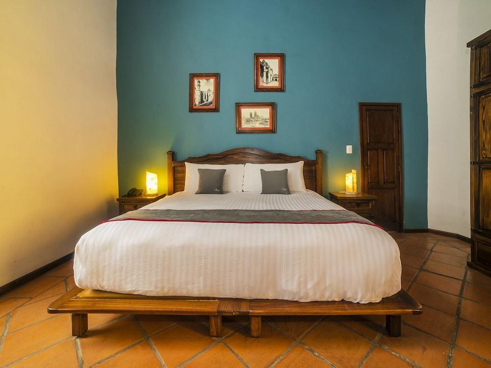 מלון Collection O Al Otro Lado Del Rio, פואבלה מראה חיצוני תמונה A bedroom at the hotel