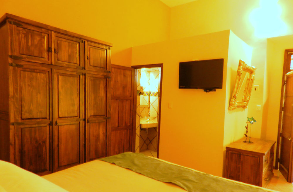 מלון Collection O Al Otro Lado Del Rio, פואבלה מראה חיצוני תמונה A room at the hotel