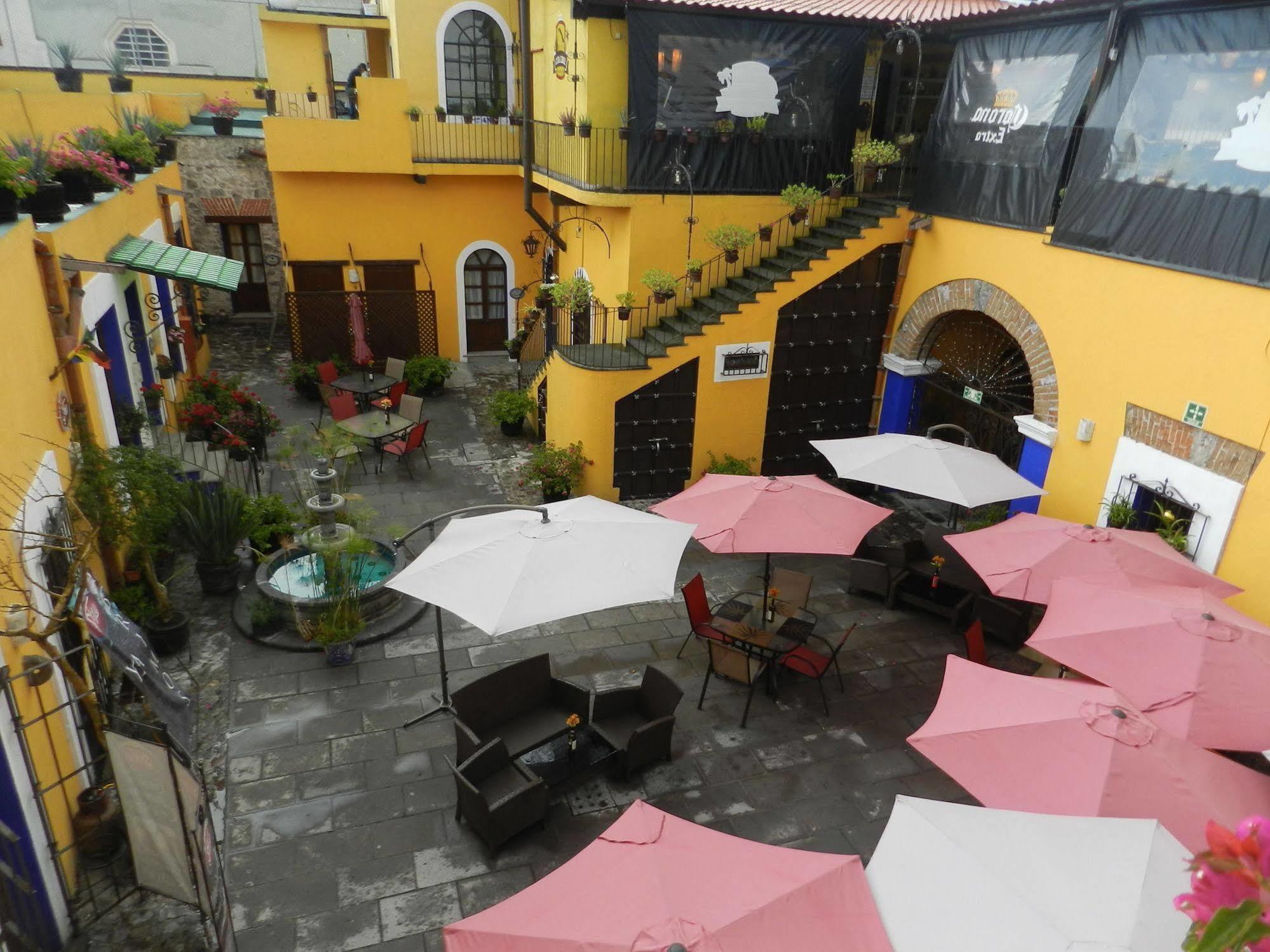 מלון Collection O Al Otro Lado Del Rio, פואבלה מראה חיצוני תמונה Patio of the restaurant
